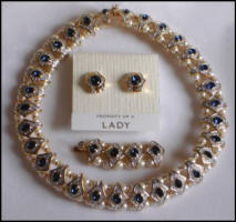 Propert of a Lady choker necklace with extender for lengthening and earrings in Swarovski crystal.