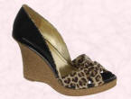 Wedge shoes with animal print peep toe are by Dune.