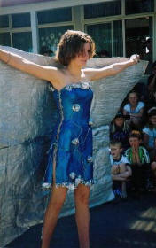 Girl wearing paper dress