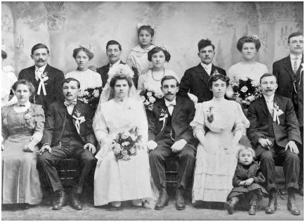  1912 Old Late Edwardian Wedding Photo. The bride and groom (centre front) 