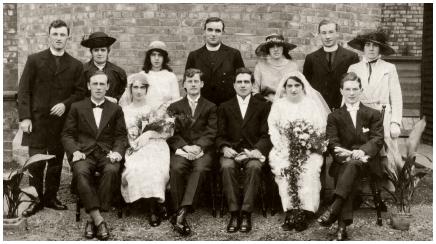 A 1921 Double Wedding in Hebburn. Front row centre left - Margaret Laydon, the first bride with her bridegroom James Aspinwall M.M. Next to him in formal dress is the second bridegroom Patrick Thomas Rowan, who married bride Maria Laydon far right.  