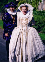 Elizabeth 1 at the Picture of Henry VIII at the  Elizabethan and Tudor Themed Fancy Dress Wedding 