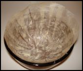 Butter and then line your selected pudding basin with some greaseproof paper. Butter inside too.
