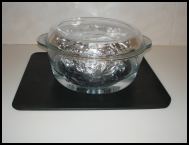 Oven steaming a Christmas pudding in a pyrex casserole water bath.