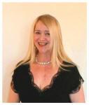 3 - Pauline Weston Thomas wearing 18" clip in human hair extensions after trimming and styling.