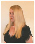 Side view - Pauline Weston Thomas in 18" clip in human hair extensions after trimming and styling.
