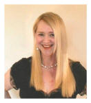 Pauline Weston Thomas in 18" clip in human hair extensions after trimming and styling.